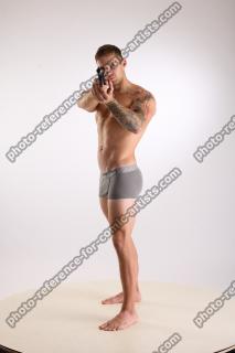 Piero Pose With Revolver